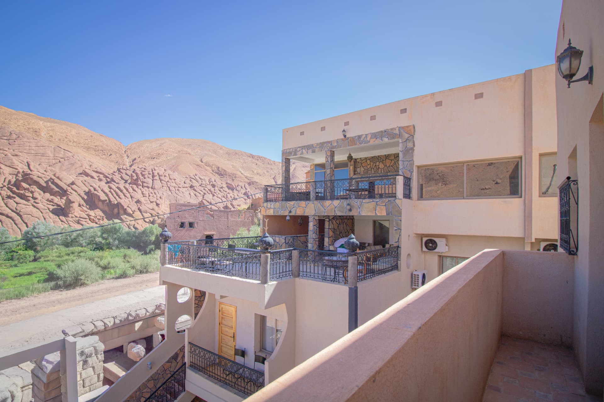 TIRIT — balcony over the riad terraces and canyon