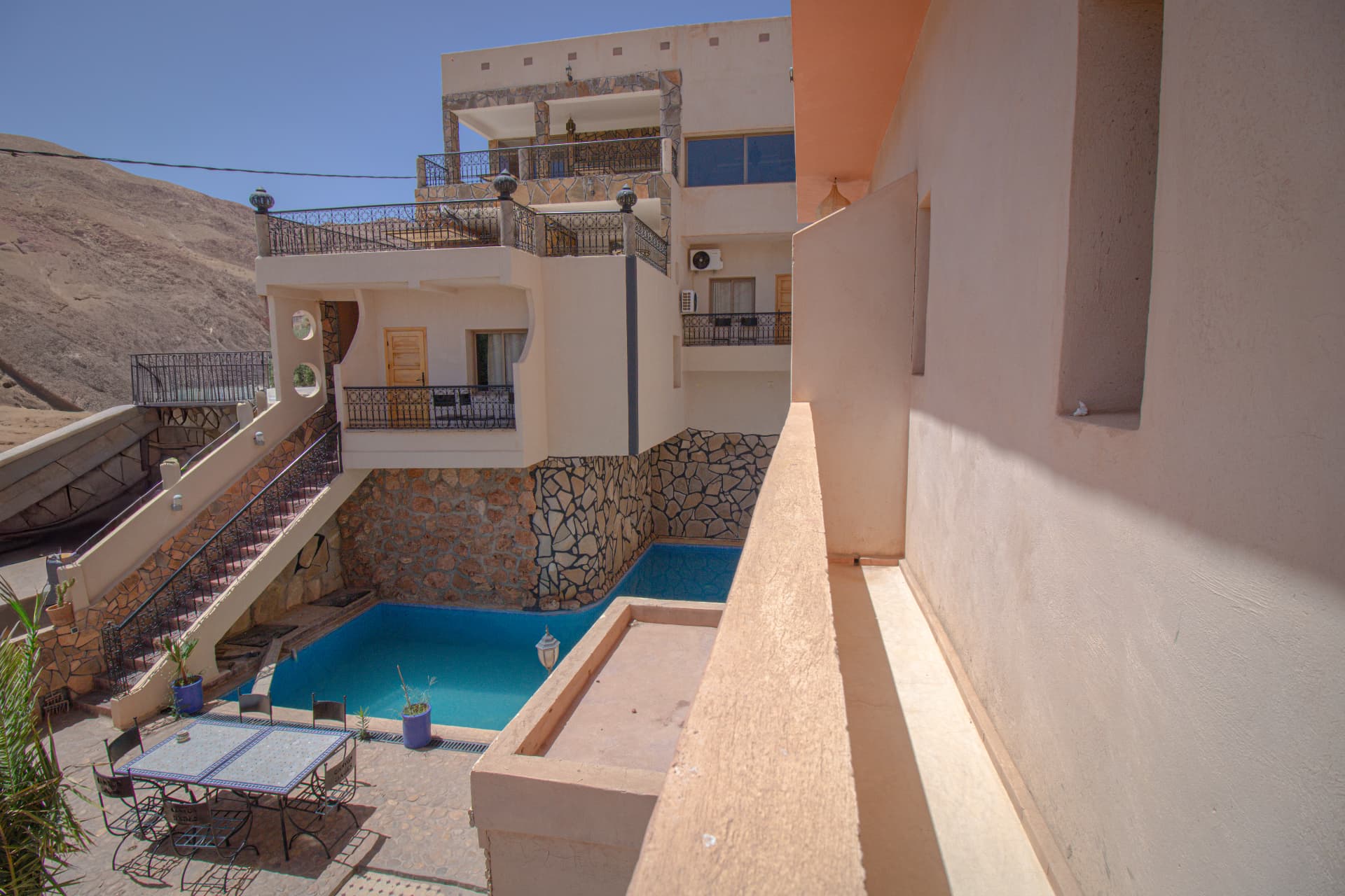 ATLAS — view over the riad pool and terraces