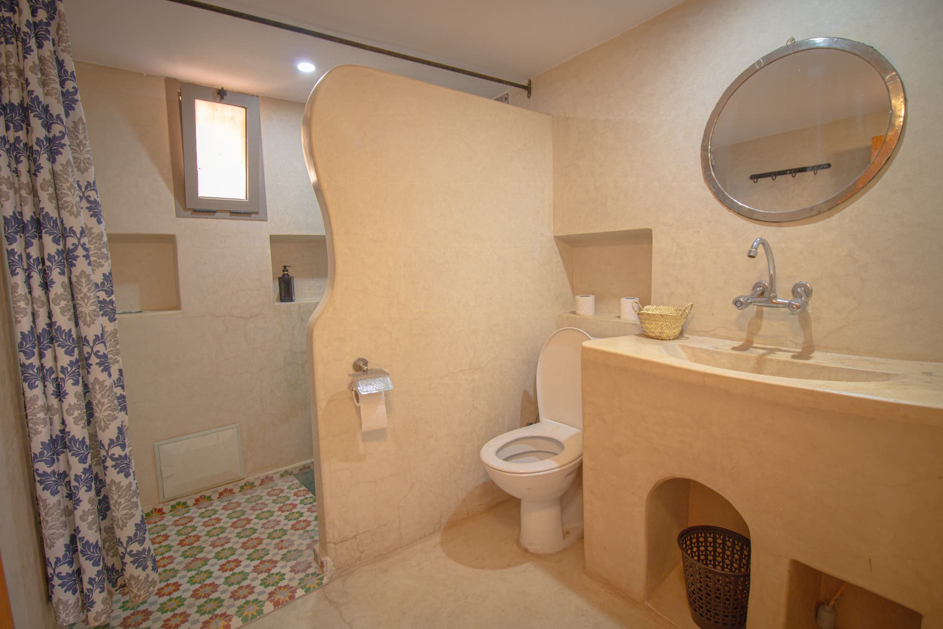 TIRIT — bathroom with zellige floor and walk-in shower